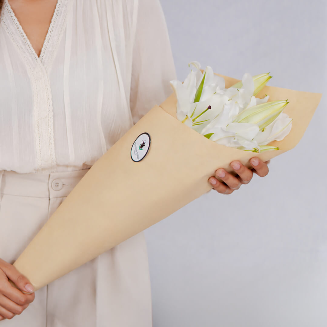 Lily cut flowers carefully wrapped for bouquets and professional floral designs.