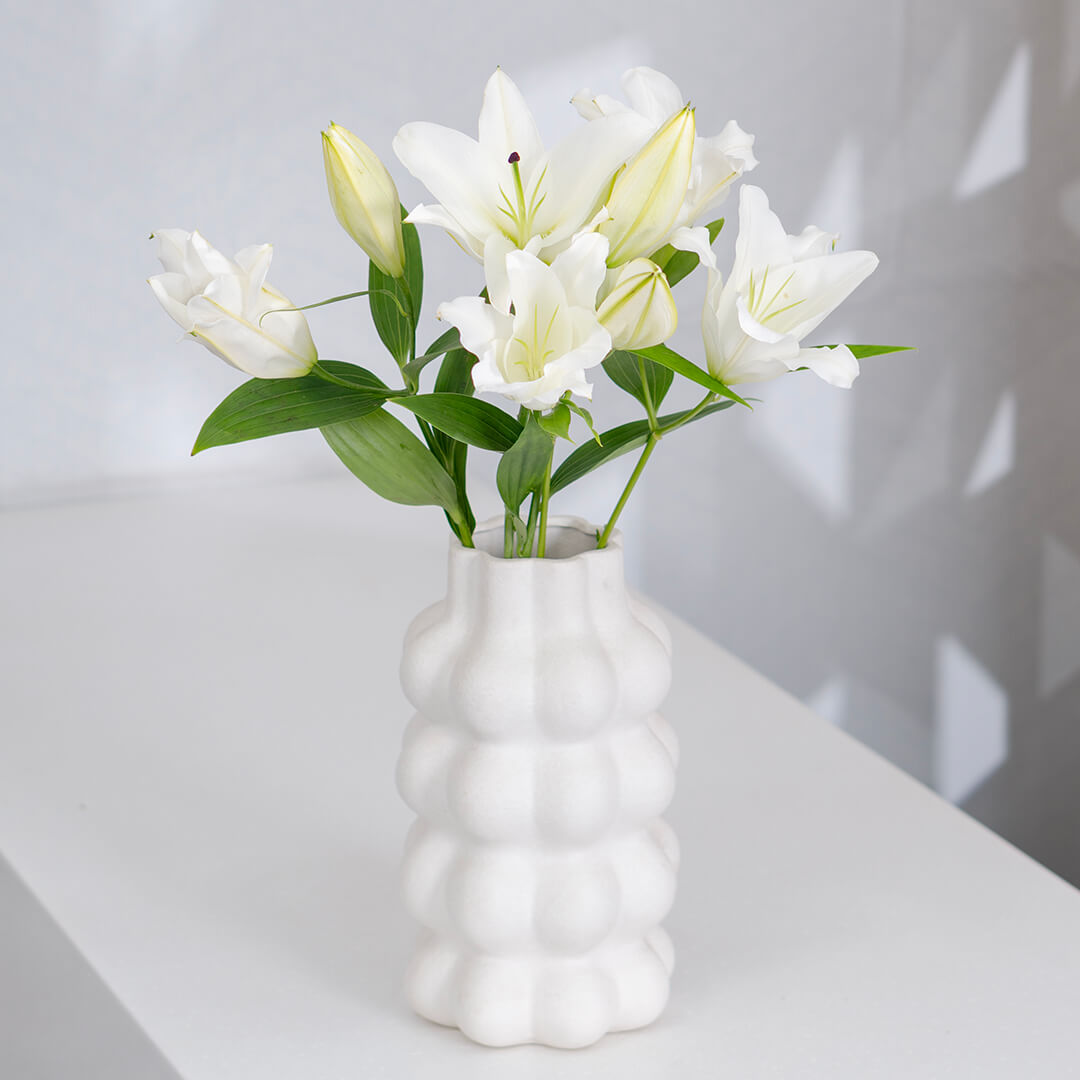 Lily cut flowers carefully wrapped for bouquets and professional floral designs.