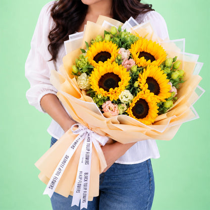 Fresh yellow sunflowers and eustoma wrapped in Korean-style flower sheets
