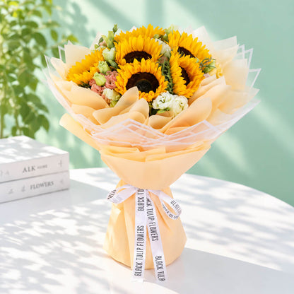 Fresh yellow sunflowers and eustoma wrapped in Korean-style flower sheets