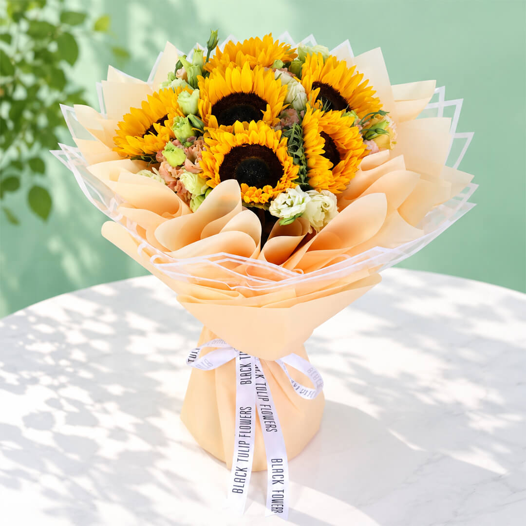 Fresh yellow sunflowers and eustoma wrapped in Korean-style flower sheets