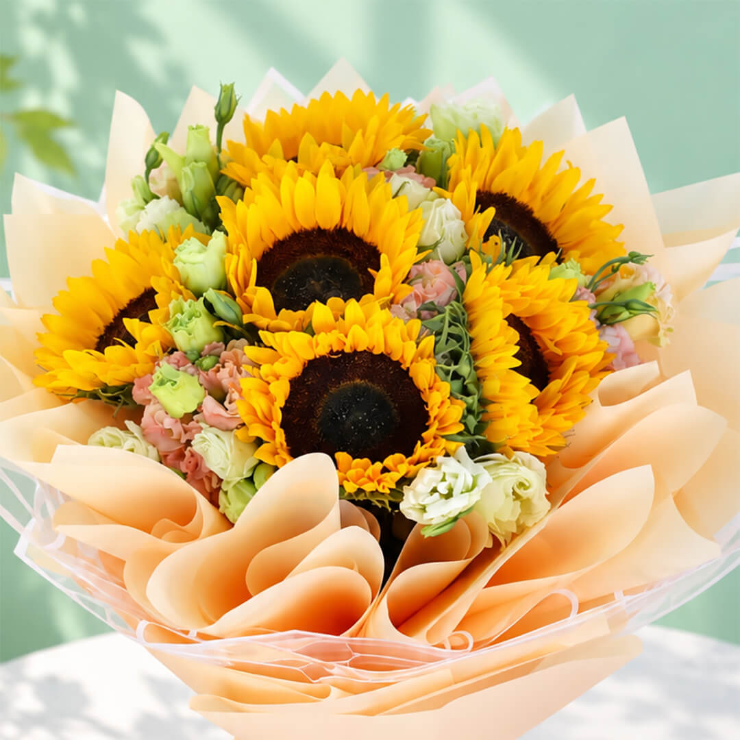 Fresh yellow sunflowers and eustoma wrapped in Korean-style flower sheets