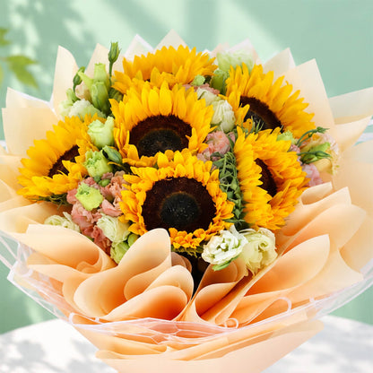 Fresh yellow sunflowers and eustoma wrapped in Korean-style flower sheets