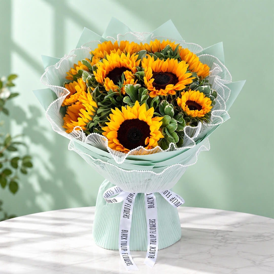 Sunflowers and greenery in Korean-style wrapping