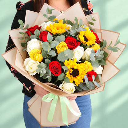 Sunflower, rose, hypericum and eucalyptus bouquet in Korean-style wrapping.