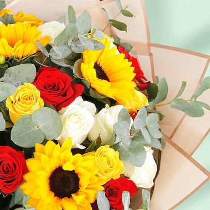 Sunflower, rose, hypericum and eucalyptus bouquet in Korean-style wrapping.
