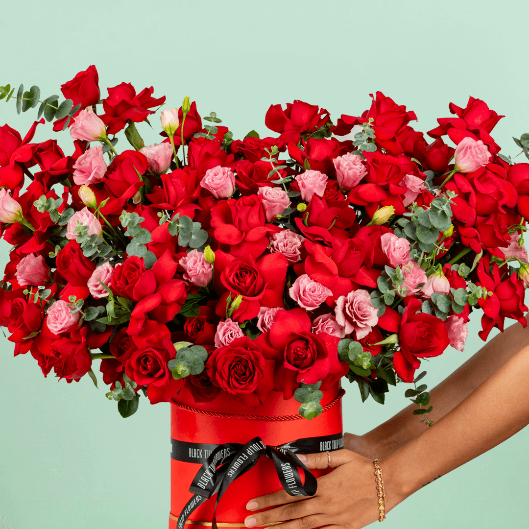 Enchanted red rose box with Eustoma eucalyptus and premium round red base