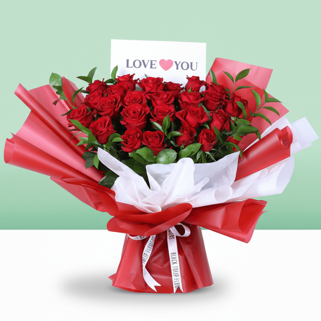 Romantic Crimson 25 Rose Bouquet arranged with 25 red roses with lush foliage