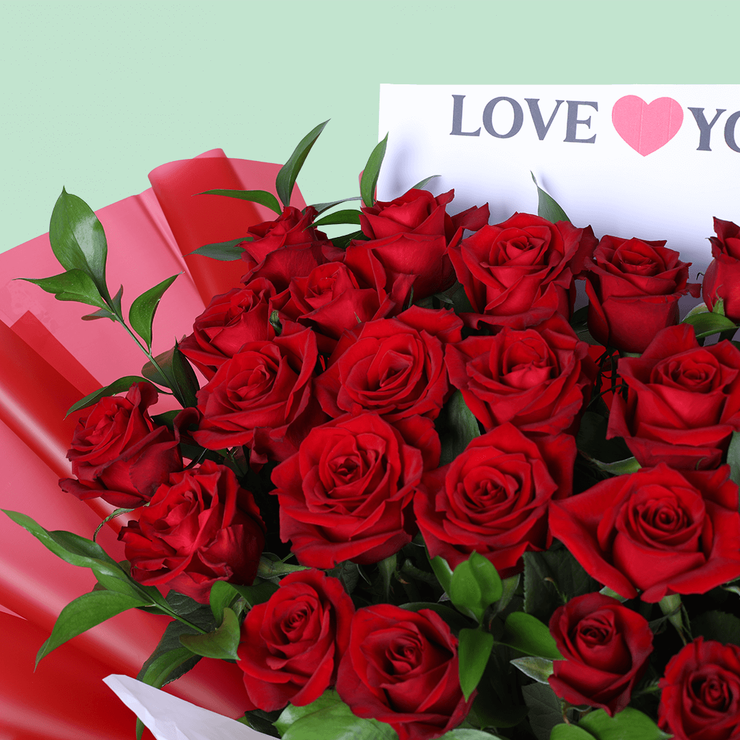 Romantic Crimson 25 Rose Bouquet arranged with 25 red roses with lush foliage