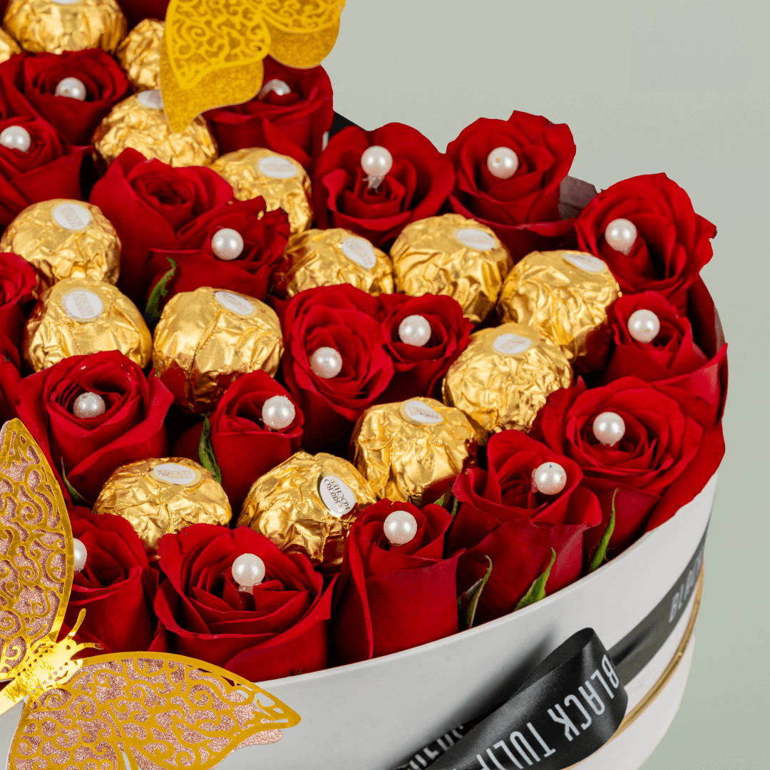 Red Roses & Ferrero Heart Box arranged with red roses, white roses and Ferrero Rocher chocolates
