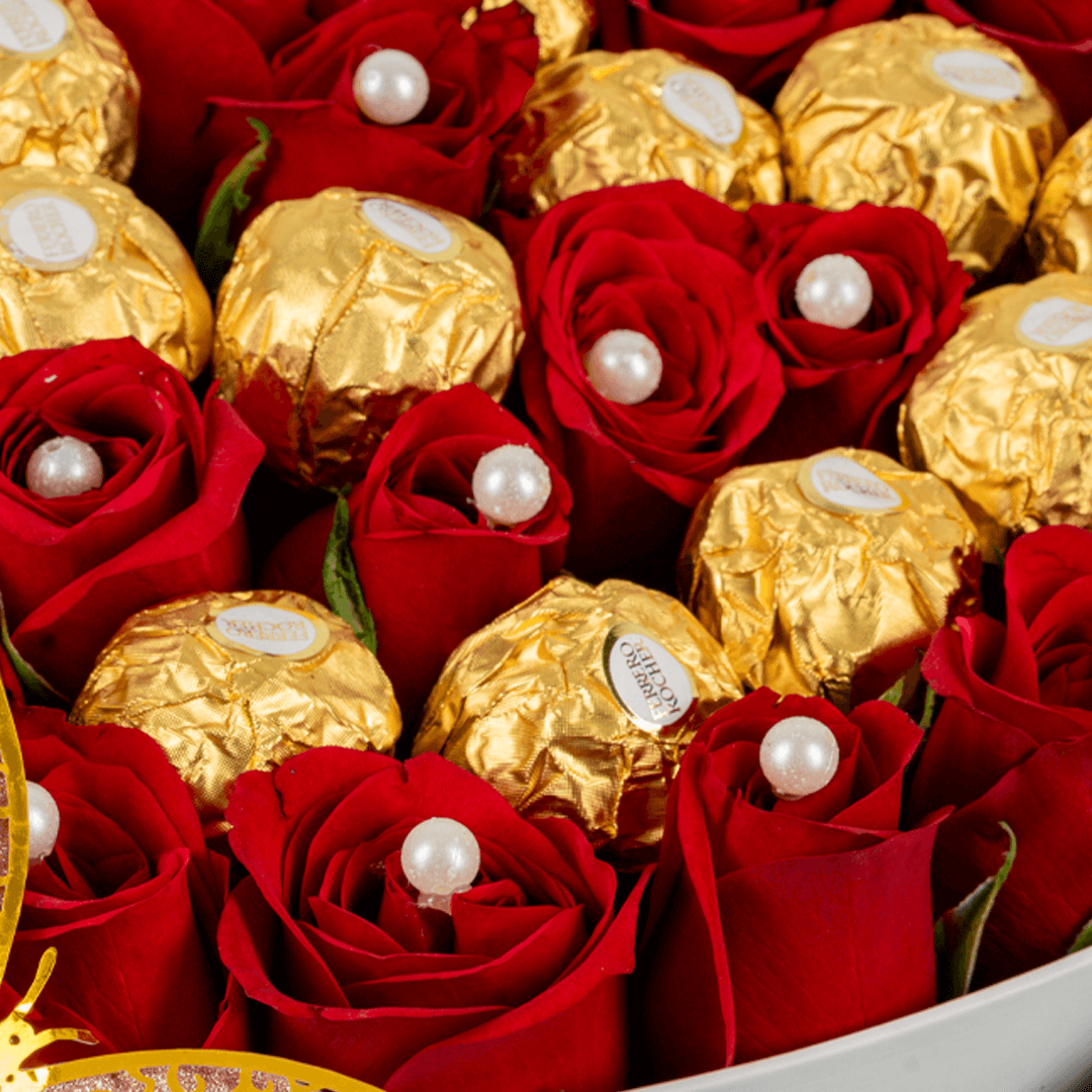 Red Roses & Ferrero Heart Box arranged with red roses, white roses and Ferrero Rocher chocolates