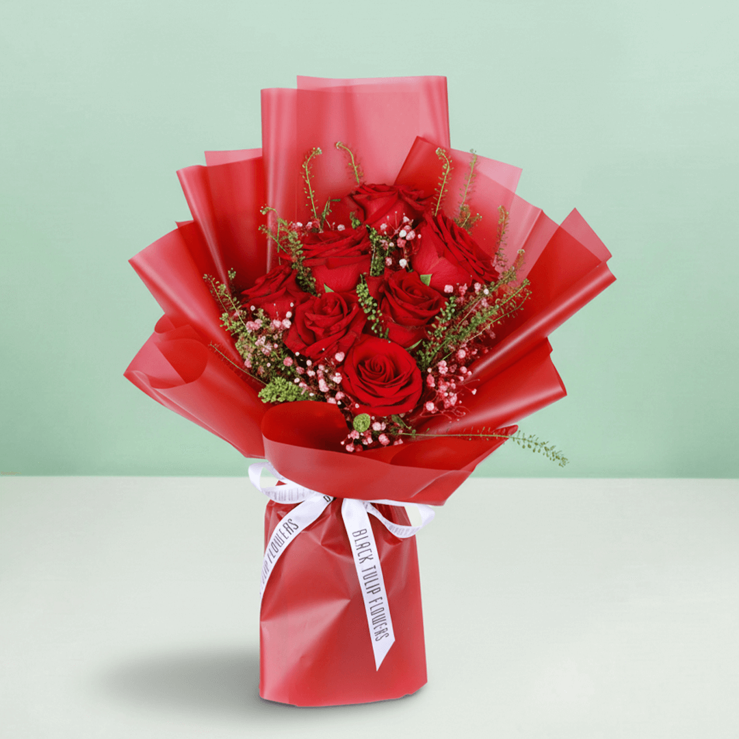 Timeless Love 10 Red Rose Bouquet arranged with 10 fresh red roses with soft fillers