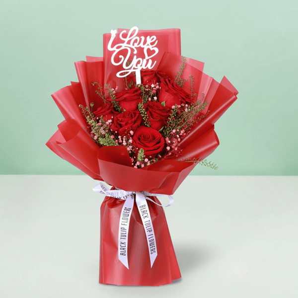 Timeless Love 10 Red Rose Bouquet arranged with 10 fresh red roses with soft fillers