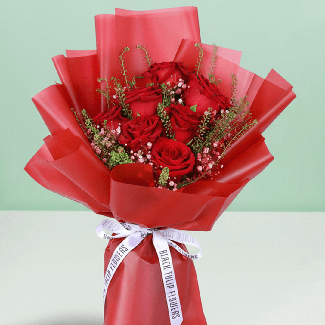 Timeless Love 10 Red Rose Bouquet arranged with 10 fresh red roses with soft fillers