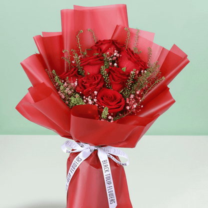 Timeless Love 10 Red Rose Bouquet arranged with 10 fresh red roses with soft fillers