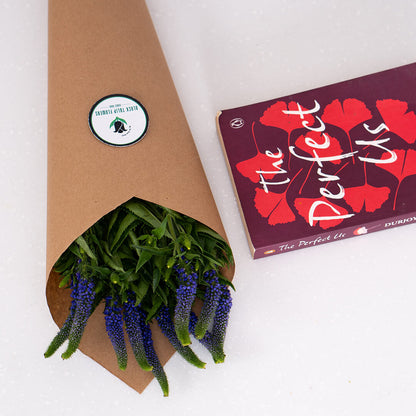 Veronica flowers displayed as cut stems wrapped in brown sheet
