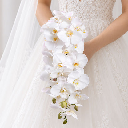 Sophisticated wedding bouquet featuring Phalaenopsis orchid flowers arranged in a stunning cascade style