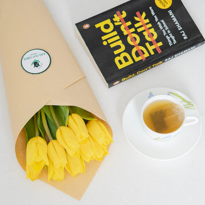 Fresh yellow cut tulip flowers with bright golden petals in a spring bouquet