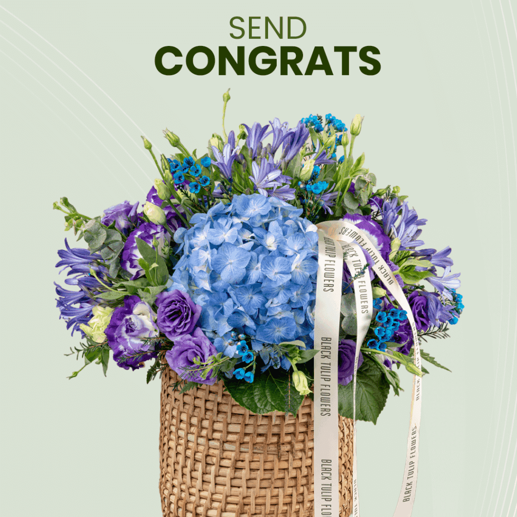Send Congrats - Blue themed flowers in a basket