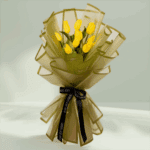 10 yellow tulips bouquet wrapped in olive green Korean flower paper with black satin ribbon